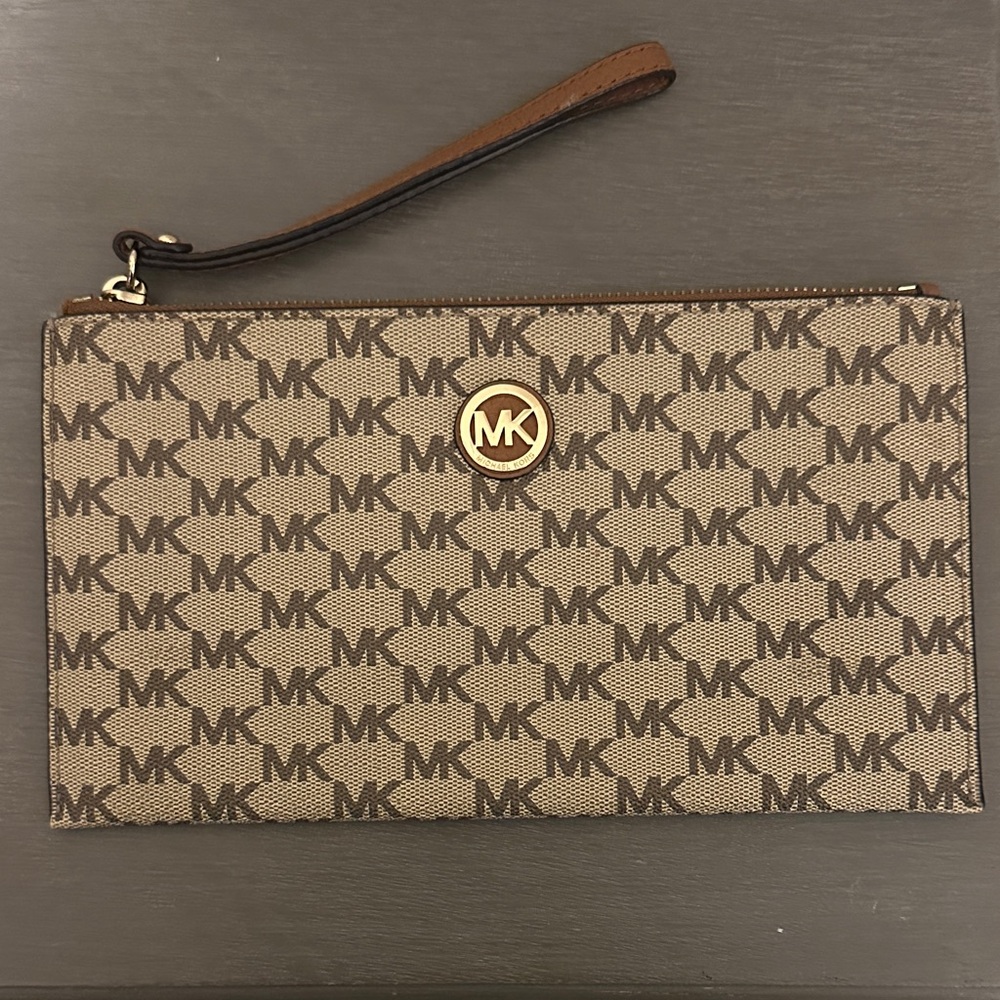 Michael Kors Tan and Brown Monogram Wristlet. Excellent condition.